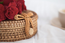 red roses on a woven basket 