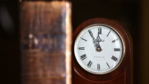old Bible and antique clock 