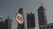 Downtown Dubai with buildings and skyscrapers in cinematic slow motion.