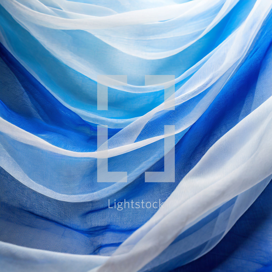 draped blue and white woven fabrics