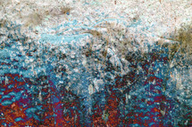 Abstract grunge background in blue, white, gray, red, orange, rust