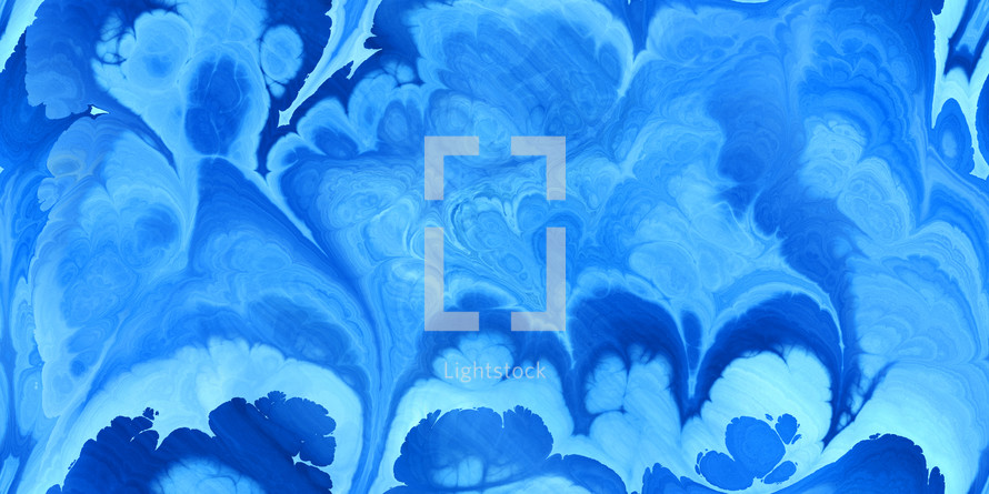 marbled blue pattern creates a seamless tile for a repeatable background 