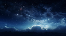 Bright stars and clouds in the night sky. 