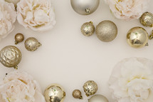 gold ornaments and light pink flowers 