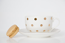 tea cup and macaroon