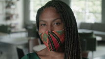 African American woman in a face mask 