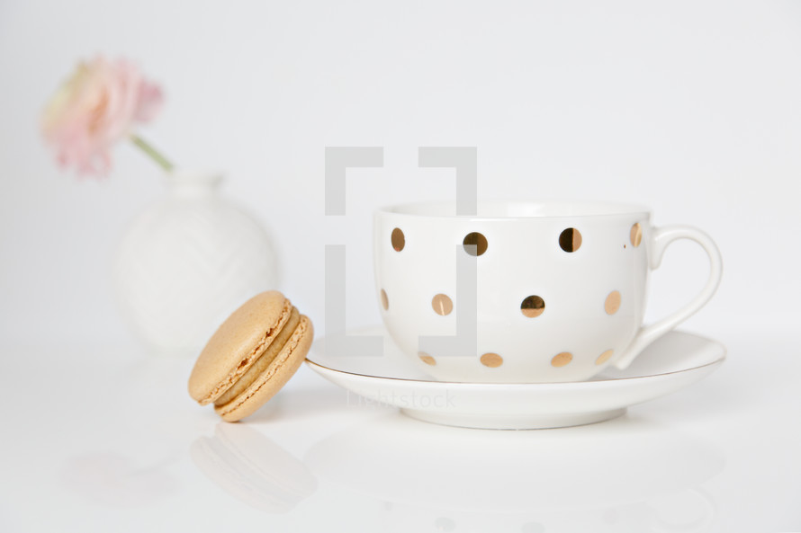 tea cup and macaroon