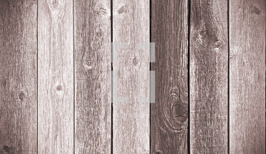 Weathered fence panel in brown with slight vignette