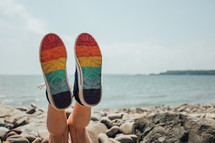 rainbow colored soles of shoes 