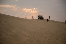 jeep on desert sand dunes in India 