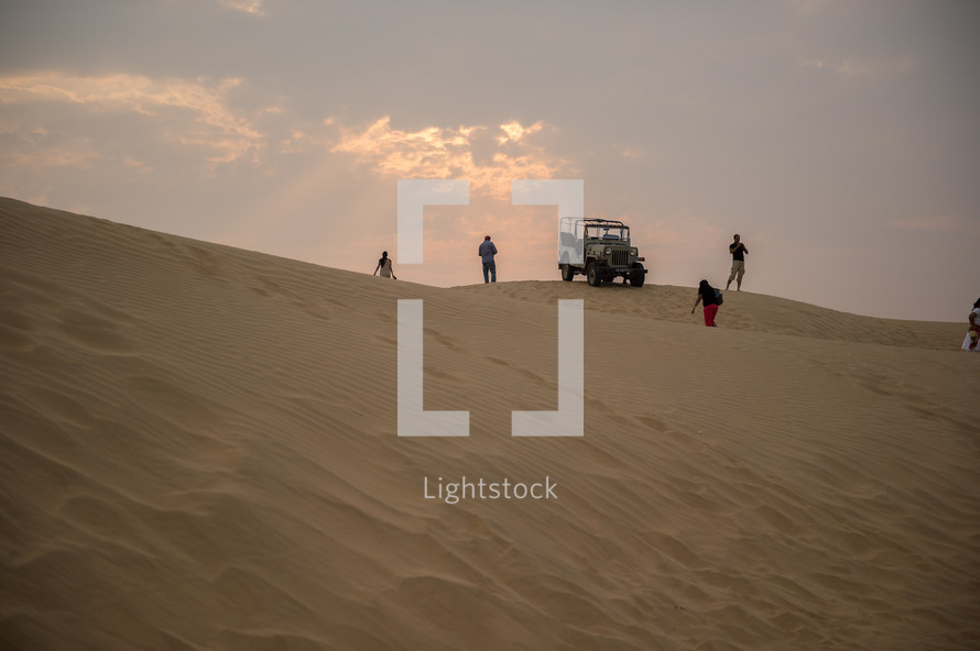 jeep on desert sand dunes in India 