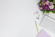 purple flowers, desk, pen, gold, computer keyboard, workspace, copy space, clips, journal, flower arrangement, home office, spring, summer, violet 