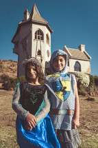 kids dressed up as a princess and knight