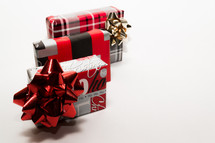 wrapped Christmas gifts on a white background 