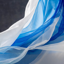 draped blue and white fabric background art