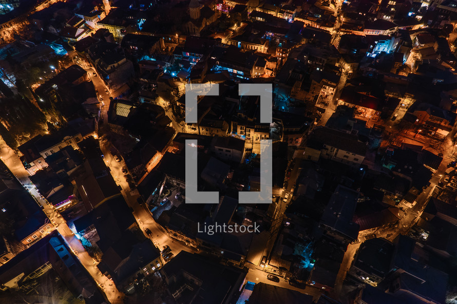 Illuminated street in the Night City aerial
