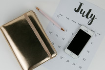 planner, calendar, pencil, and iPhone 
