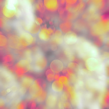 orange and yellow bokeh light effect with soft zoom blur