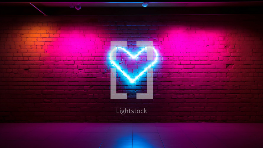 Neon heart on a brick wall