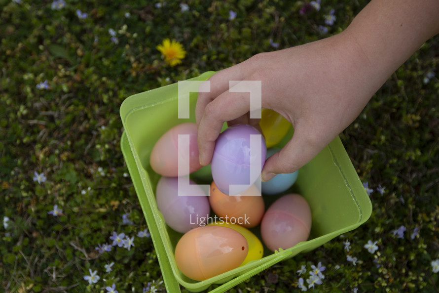 plastic Easter eggs in a bucket 