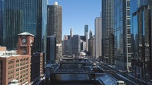 Aerial view of Downtown Chicago, The Magnificent Mile, Chicago River, and The Bean.