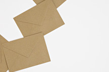 brown envelopes on white 