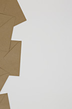 brown envelopes on white background 