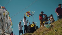 People With Their Kites During Dia de los Muertos In Sumpango, Guatemala - wide	