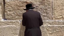 Orthodox man prays at Western Wall in Jerusalem, Israel