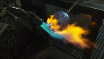 flames melting glass