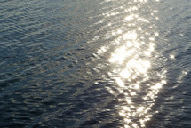 sunlight on rippled water surface