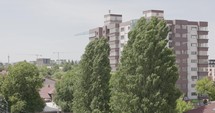 Cosbuc Street, Galati, Romania - A Sight of Residential Structures and Towering Trees - Wide Shot	