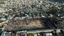 Aerial Drone shot of People Joining The Annual Sumpango Kite Festival In Honoring Dead Ancestors In Guatemala. 