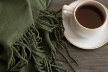 blanket and coffee cup 