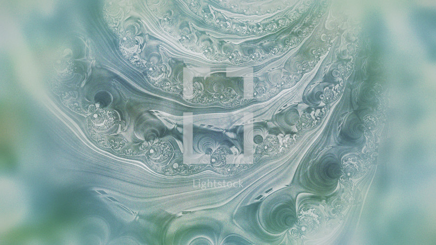 soft blue, green and white swirl effect abstract background like part of a seashell closeup