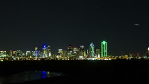 Timelapse of the downtown Dallas skyline at night.