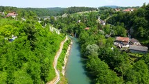Aerial shot drone flies along river in Rastoke, Croatia