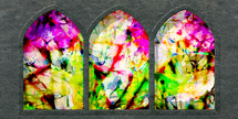 bold colors in stained glass window arches 