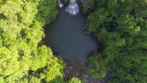 Top Down Look on Waterfall in Jungle
