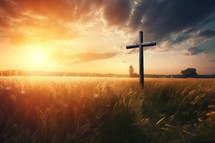 A Cross with Beautiful Field at Sunset
