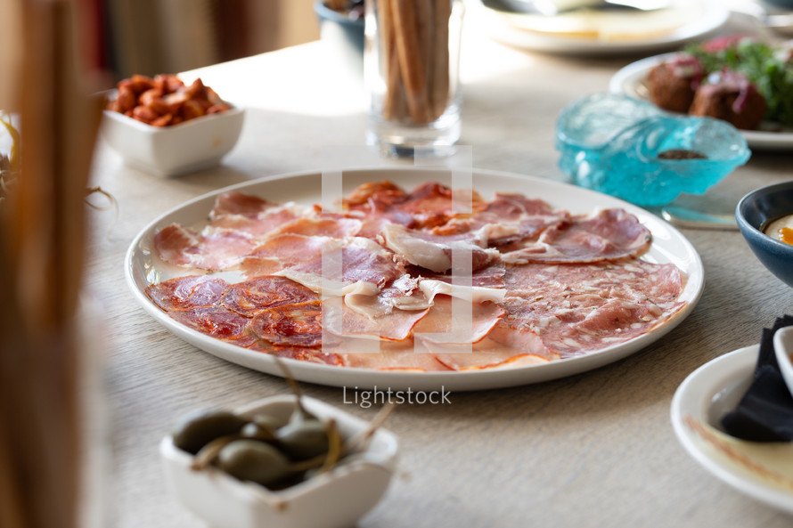 Meat and ham, healthy food, antipasti European style buffet, lunch cuisine