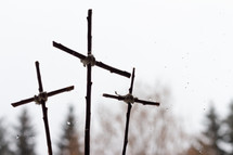 three crosses against a winter sky 