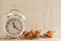 alarm clock with fall foliage 