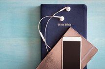 Bible, journal, cellphone, earbuds 