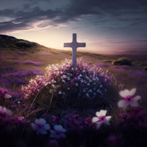 Grave stone cross in a beautiful field of flowers at sunset in a cloudy day. Christian concept
