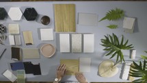 Man architect designer choosing material samples close up.  materials for decoration

