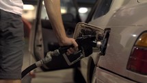 4K Slider Shot Pumping Gass Into Car Fuel Pump
