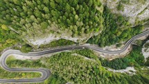 Aerial view of a winding road in Bicaz Gorge in Hasmas National Park in northeastern Romania.