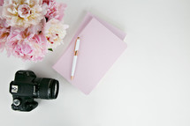 camera, photography, white background, pink, notebooks, pen, vase, flowers 
