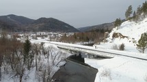 Aerial Winter Landscape with Bridge